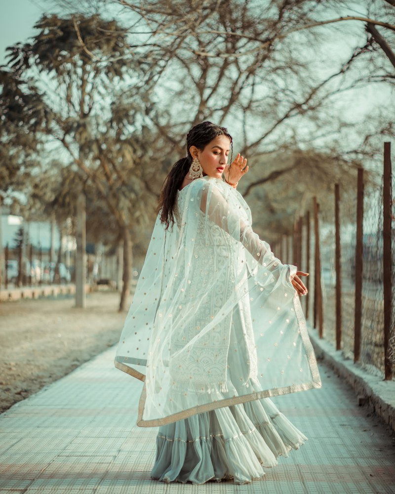 Woman in pink saree apna style